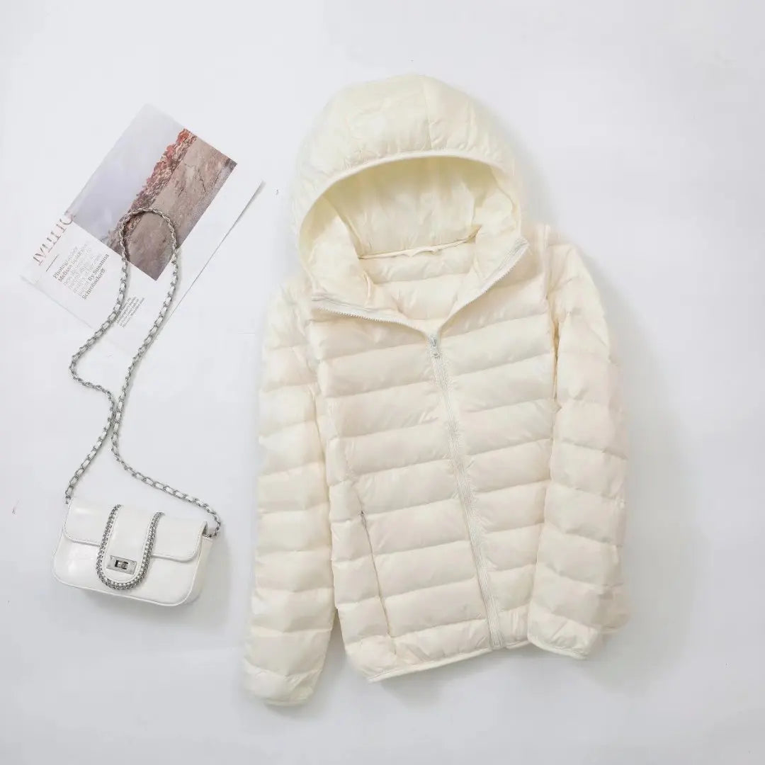 Damen Daunenjacke mit Kapuze – warme gefütterte Winterjacke