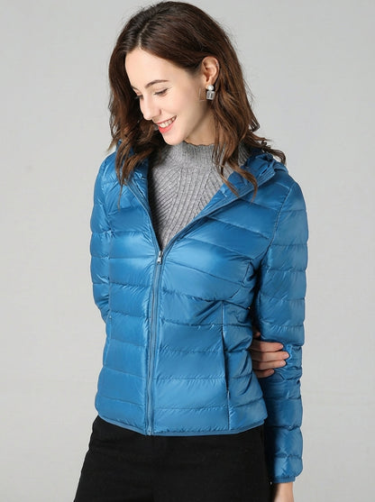 Damen Daunenjacke mit Kapuze – warme gefütterte Winterjacke